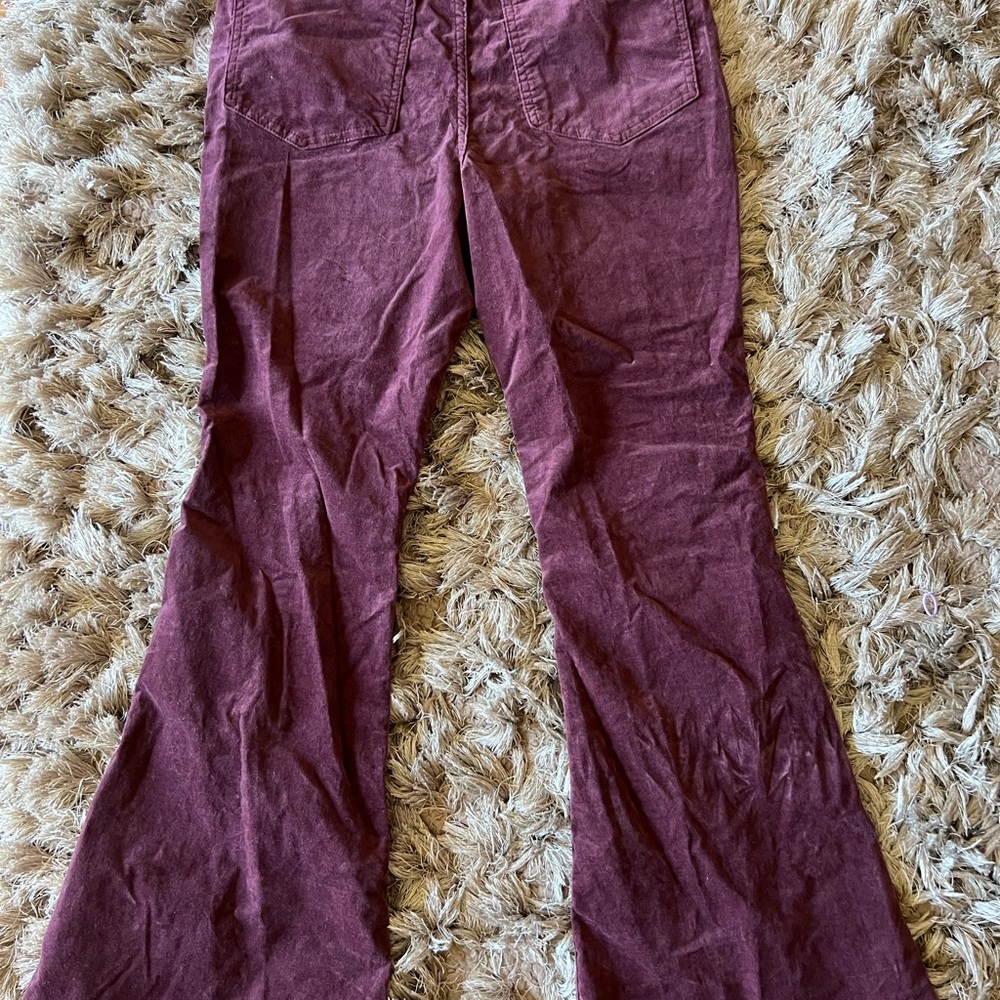 Burgundy flared pants with slit at the bottom